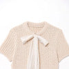 Round neck transparent stiff yarn bow decoration knitted short sleeved top for women